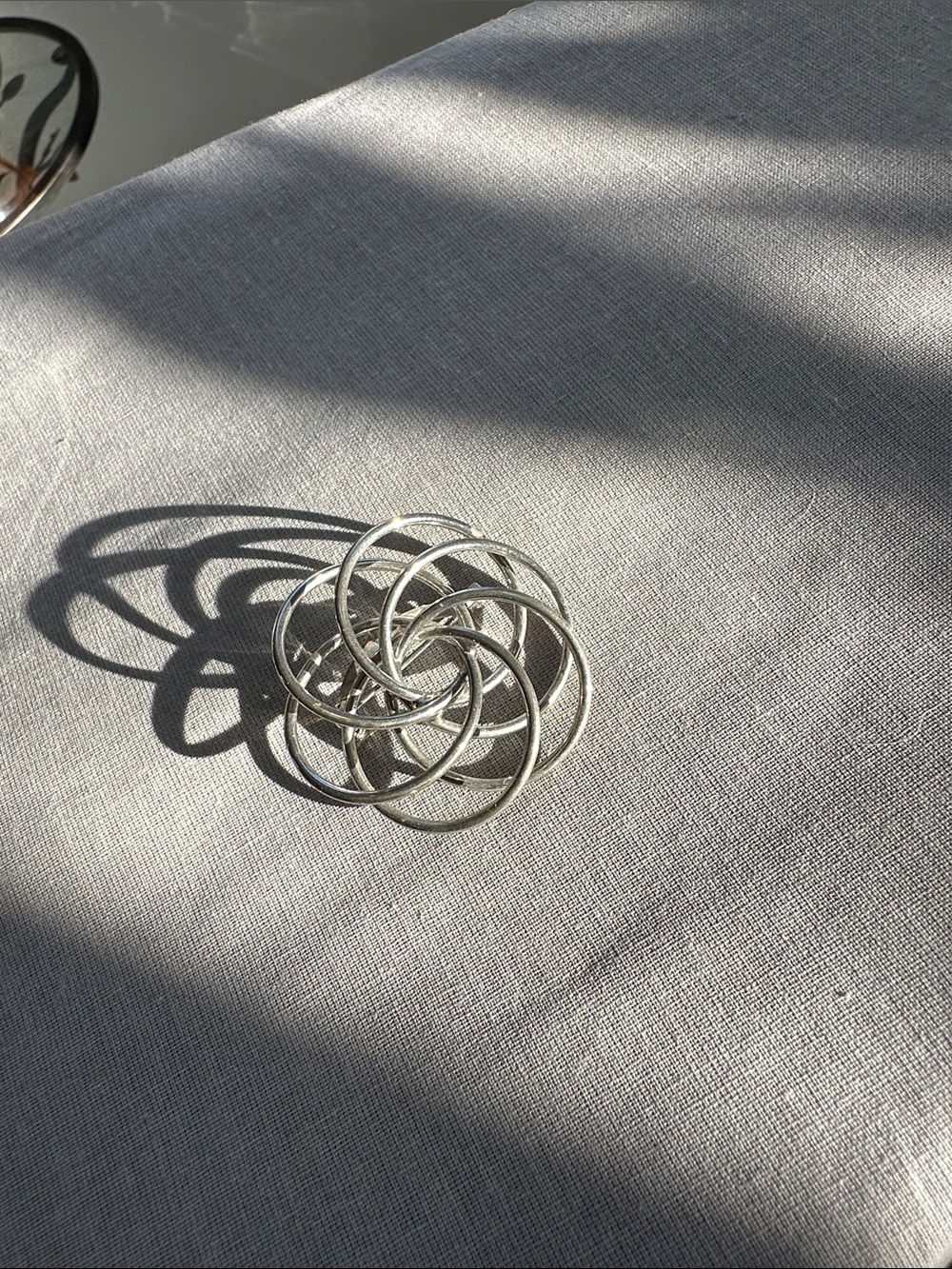 Interlocking Silver Knot Brooch